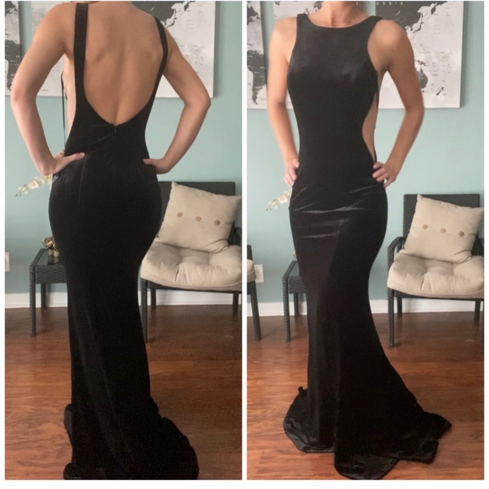 Stunning black velvet gown. Only worn once for a photo shoot.